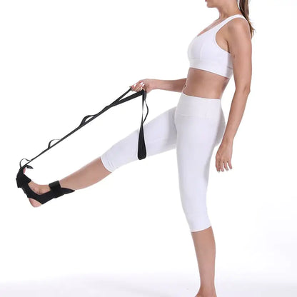 Yoga practitioner using a stretch strap for enhanced flexibility and deep muscle stretching during practice.